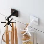 1pc Black Kitchen Rotating Punch-free Wall-mounted Shelf 6 Rotating Hooks Pot Shovel Chopping Nail-free Adhesive Hook Rack